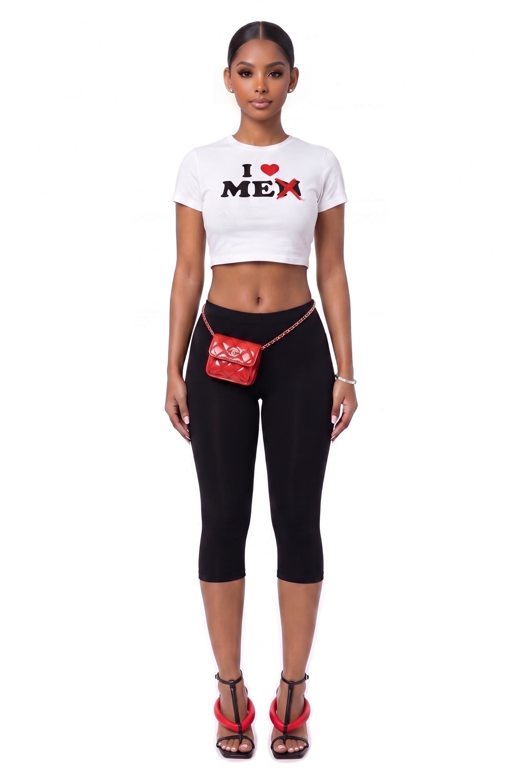 Model wearing the In Love With Me Crop Tee, a white crop tee with an I love Me graphic, with black capri leggings and a red bag